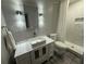 Bathroom with white vanity, marble shower, and modern fixtures at 3759 Stanford Cir, Decatur, GA 30034