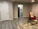Living room with tiled floors and a view to other rooms at 3759 Stanford Cir, Decatur, GA 30034