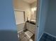 Clean bathroom with modern vanity and dark tile floors at 3759 Stanford Cir, Decatur, GA 30034