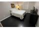 Bedroom with dark hardwood floors and a double bed at 3759 Stanford Cir, Decatur, GA 30034