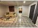 Living room with tiled floors, a couch and an armchair at 3759 Stanford Cir, Decatur, GA 30034