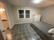 Bedroom with gray walls, tiled floor, and a dresser at 3759 Stanford Cir, Decatur, GA 30034