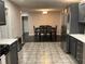Kitchen view of dining area with table and six chairs at 3759 Stanford Cir, Decatur, GA 30034