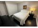 Bedroom with dark hardwood floors and a double bed at 3759 Stanford Cir, Decatur, GA 30034