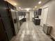 Modern kitchen with dark cabinets and stainless steel appliances at 3759 Stanford Cir, Decatur, GA 30034