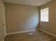 Bright bedroom with wood-look floors and a window at 99 Libby Ln, Jonesboro, GA 30238