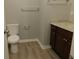 Updated bathroom with granite countertop and new toilet at 99 Libby Ln, Jonesboro, GA 30238