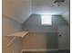 Large walk-in closet with wire shelving and a door at 99 Libby Ln, Jonesboro, GA 30238