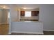 Modern kitchen features granite countertops and dark wood cabinets at 99 Libby Ln, Jonesboro, GA 30238