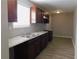 Modern kitchen with updated cabinets and flooring at 99 Libby Ln, Jonesboro, GA 30238