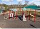 Community playground with climbing wall, slide, and covered play area at 4430 Ambassador Way, Cumming, GA 30040