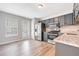 Kitchen with granite countertops, stainless steel appliances, and gray cabinets at 2791 Willow Tree Overlook, Douglasville, GA 30315