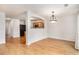 Dining room with hardwood floors, wainscoting, and chandelier at 9546 Lakeview Rd, Union City, GA 30291