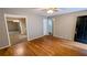 Hardwood floor living room with access to other rooms at 5453 Deerfield Trl, Atlanta, GA 30349