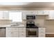 Kitchen with granite countertops and stainless steel appliances at 160 Cross Creek Pkwy, Dallas, GA 30157