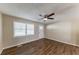 Living room with wood floors and ceiling fan at 160 Cross Creek Pkwy, Dallas, GA 30157