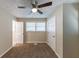 Spacious bedroom with ceiling fan, window and closet at 160 Cross Creek Pkwy, Dallas, GA 30157