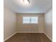 Bright bedroom with neutral walls, carpet flooring, and ample closet space at 160 Cross Creek Pkwy, Dallas, GA 30157