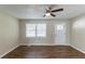 Living room with wood floors and ceiling fan at 160 Cross Creek Pkwy, Dallas, GA 30157
