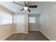 Bright bedroom with ceiling fan, large window and closet at 160 Cross Creek Pkwy, Dallas, GA 30157