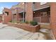 Brick building with multiple units, balconies, and landscaped courtyard at 387 Ralph Mcgill Ne Blvd # K, Atlanta, GA 30312