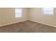 Bright bedroom with neutral walls and carpet at 3730 Douglas Ridge Trl, Douglasville, GA 30135