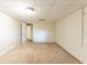 Finished basement room with carpet and access to other rooms at 3730 Douglas Ridge Trl, Douglasville, GA 30135