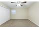Bedroom with double closets and neutral walls at 3730 Douglas Ridge Trl, Douglasville, GA 30135