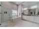 Elegant bathroom with marble flooring, double vanity, and a large shower at 55 River Meadow Ln, Social Circle, GA 30025