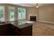 Spacious Gathering room featuring a fireplace and lots of natural light at 2814 Dominion Nw Ln, Kennesaw, GA 30144