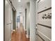 Long hallway with hardwood floors and barn doors at 1100 Howell Mill Nw Rd # 408, Atlanta, GA 30318