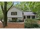 Charming white house with black windows and landscaping at 2377 Emory Ln, Marietta, GA 30068