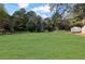 Large backyard with a grassy lawn at 2611 Kings Cir, Lawrenceville, GA 30044