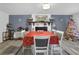 Bright dining room with a large table, chairs, and fireplace at 2611 Kings Cir, Lawrenceville, GA 30044