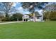 Two-story home with a spacious lawn and mature trees at 2611 Kings Cir, Lawrenceville, GA 30044