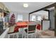 Open concept dining room with adjacent living area at 2611 Kings Cir, Lawrenceville, GA 30044