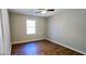 Well-lit bedroom with hardwood floors at 140 Annie Chandler Trl, Lawrenceville, GA 30045