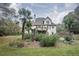 House with deck, pool, and lush landscaping at 2194 Ne Indian Shoals Dr, Loganville, GA 30052