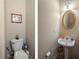 Small half bathroom with pedestal sink and toilet at 2194 Ne Indian Shoals Dr, Loganville, GA 30052