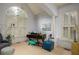 Home office with large windows, desk, and comfortable seating at 2194 Ne Indian Shoals Dr, Loganville, GA 30052