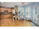 Well-equipped kitchen with light wood cabinets and granite countertops at 2194 Ne Indian Shoals Dr, Loganville, GA 30052