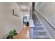 Inviting entryway with hardwood floors and a staircase leading upstairs at 135 Haven Oak Way, Lawrenceville, GA 30044