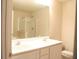 Main bathroom with double vanity, shower, and bathtub at 832 Arbor Gate Ln # 832, Lawrenceville, GA 30044