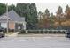 Community pool with brick pool house and parking at 832 Arbor Gate Ln # 832, Lawrenceville, GA 30044