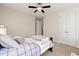 Bedroom with a twin bed, carpet, and double doors at 2640 Joseph Dr, Cumming, GA 30028