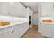 Kitchen with white cabinets, built in oven and pantry at 2640 Joseph Dr, Cumming, GA 30028