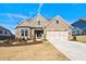 Brick ranch home with three-car garage at 2640 Joseph Dr, Cumming, GA 30028