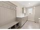 Laundry room with built-in cabinets and a convenient countertop at 2640 Joseph Dr, Cumming, GA 30028