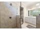 Large walk-in shower with glass enclosure and neutral tile at 2640 Joseph Dr, Cumming, GA 30028