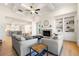 Living room with coffered ceiling and open floor plan at 2640 Joseph Dr, Cumming, GA 30028